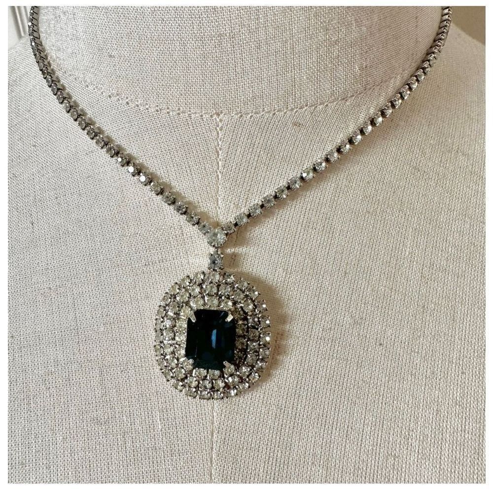 Silver tone rhinestone and blue pendant necklace